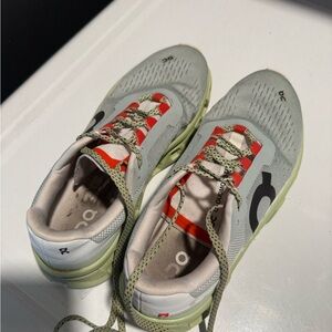 On Running Sneakers in Gray and Olive with Red Accents